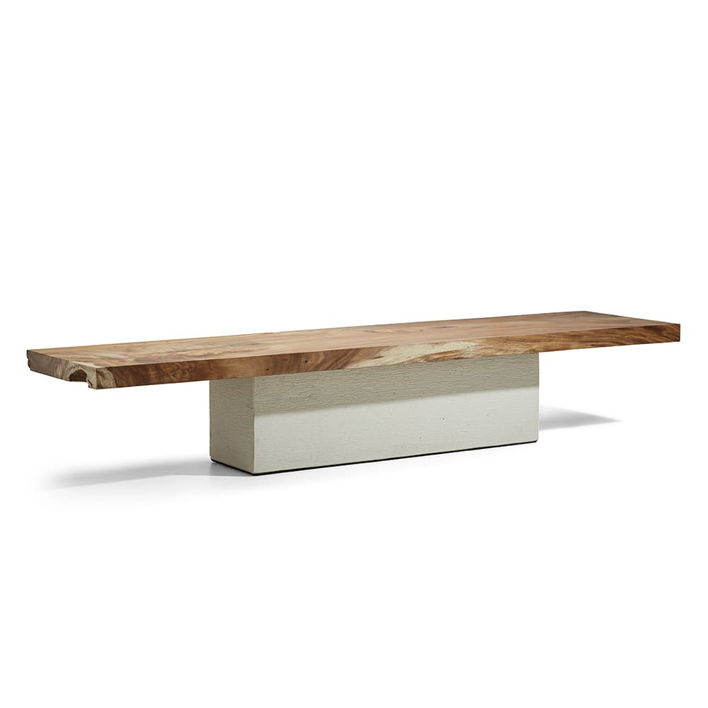 A modern minimalist bench featuring a thick slab of natural wood as the seat supported by a solid rectangular beige base.